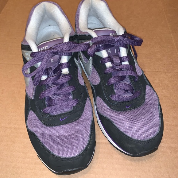 purple and black nike tns